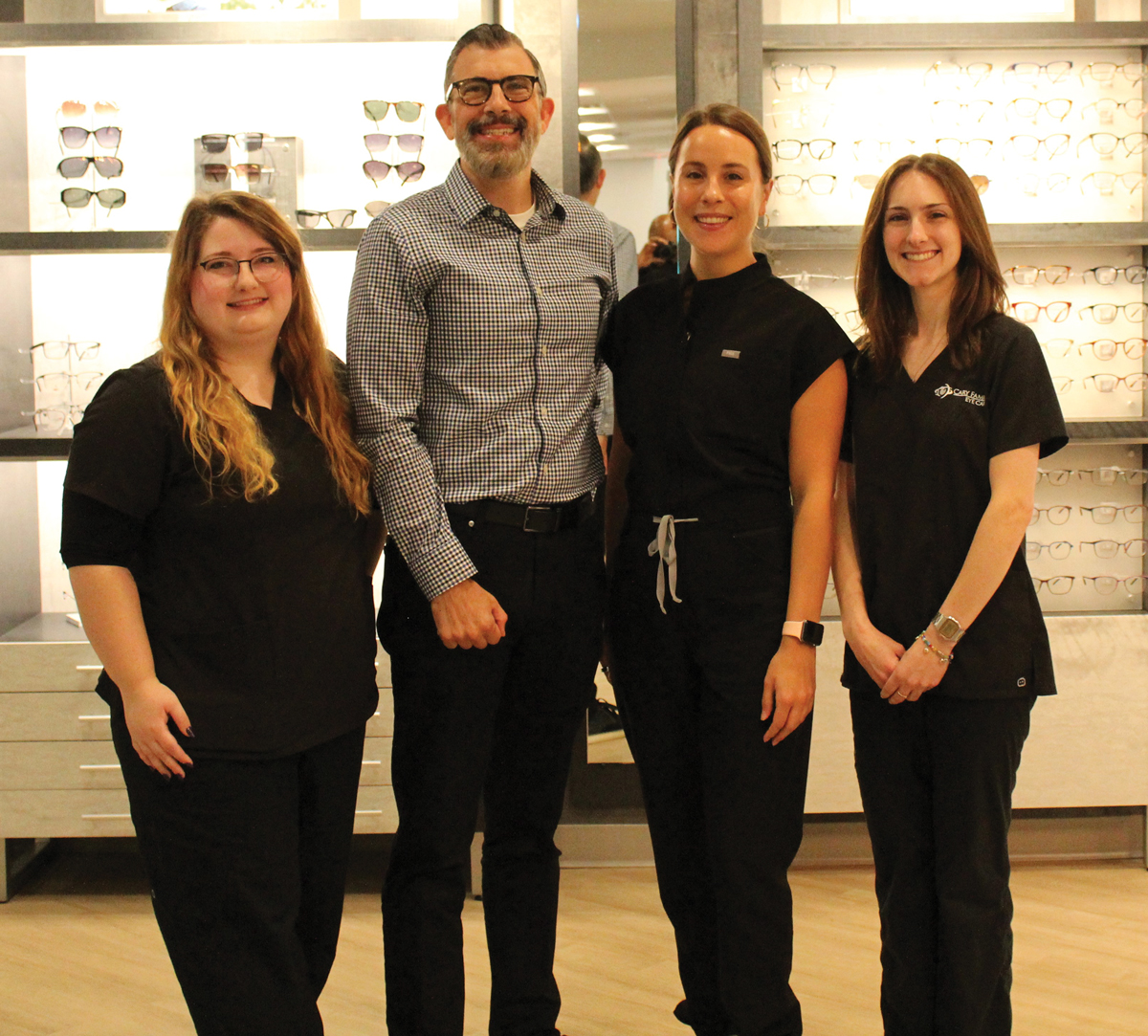 The Cary Family Eye Care Myopia Control team (left to right): Kristen McGarvey (Myopia Control Coordinator), Dr. Dwight Barnes, Dr. Rachel Kormos and Bryce Poole (Clinic Assistant).